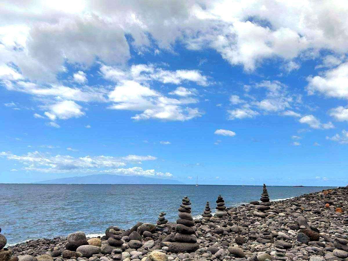 Pebble beach with stone cairns in south Tenerife