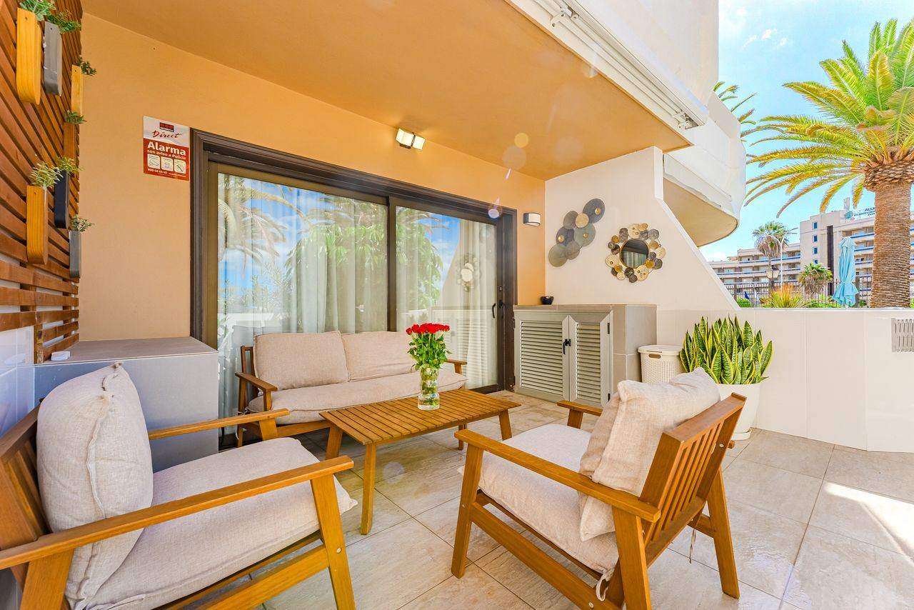 The apartment's terrace with seating area